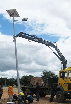 Réverbère solaire intégré 60w plaque 8m pôle en Zambie